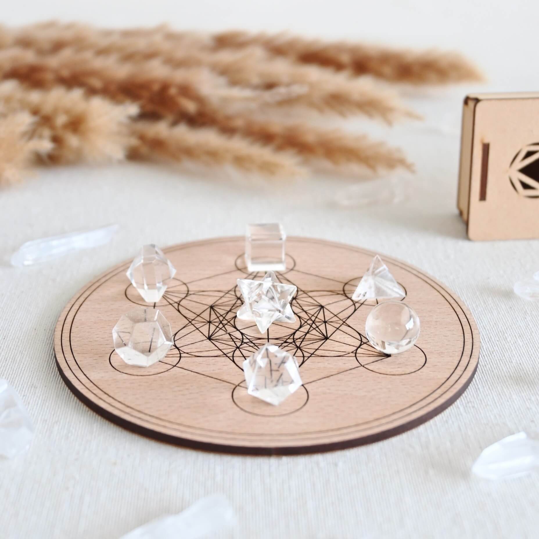 Set sólidos platónicos de cuarzo cristal + Placa con metatrón