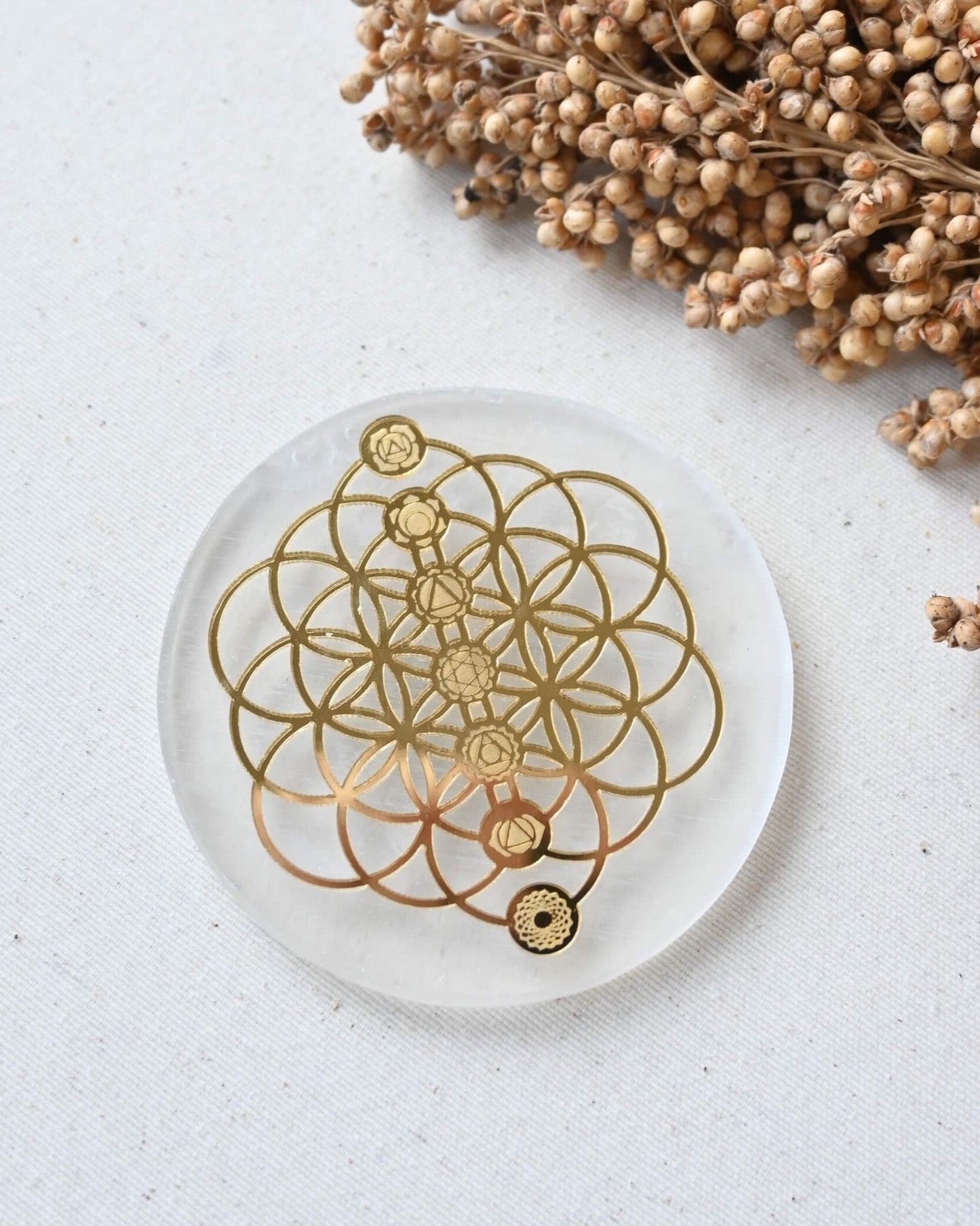 Base selenita 8cm Flor de la vida 7 chakras